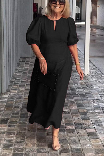 "Natalia | Zeitloses Eleganzkleid" could be rewritten as "Natalia | Klassisches Eleganzkleid".